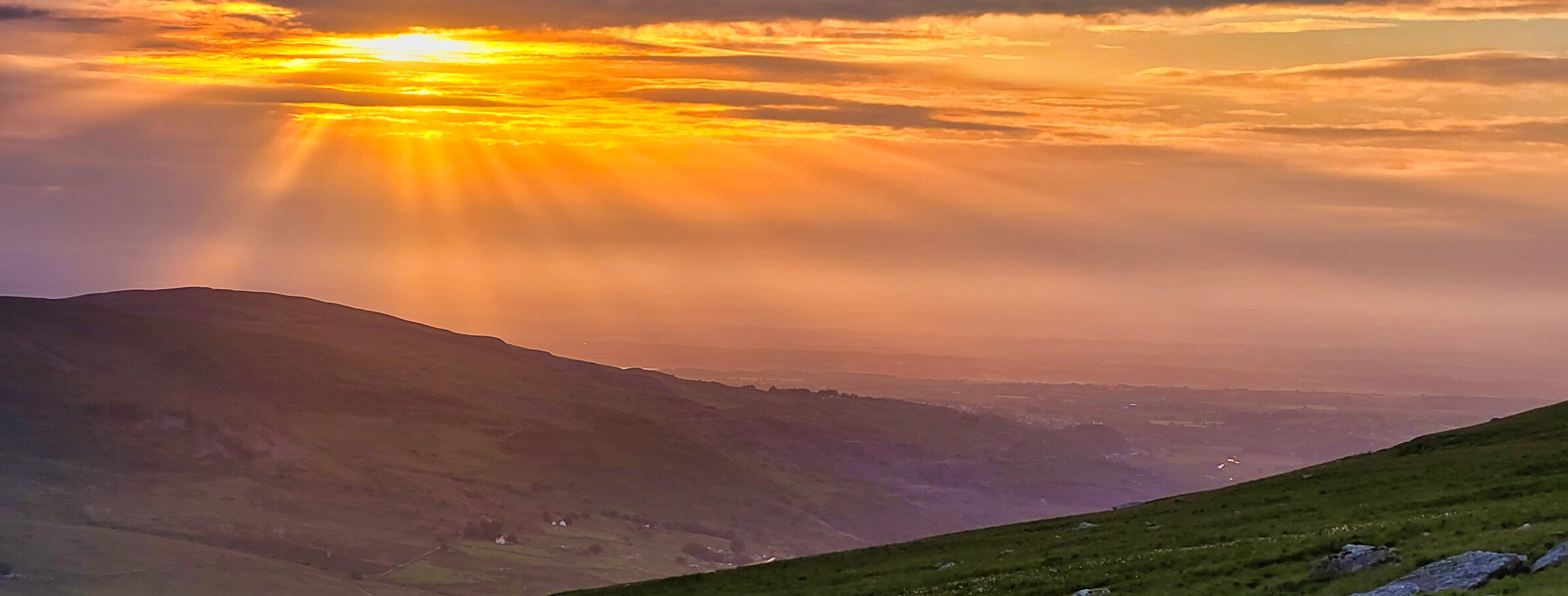 Sunset over Eryri, Snowdonia walking up to camp on Yr Wyddfa, Snowdon